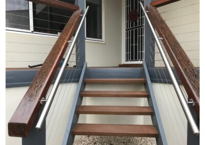 Bilateral stainless steel rails ON timber rails