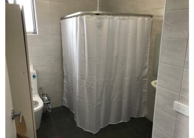 L shaped rod and shower curtain