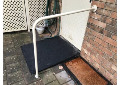Rubber ramp with powder coated galvanised banister rail